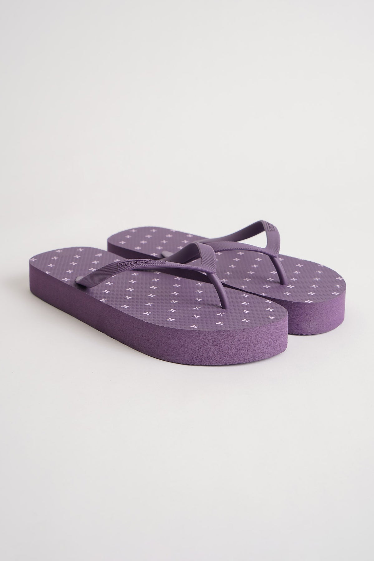 dark purple flip flops